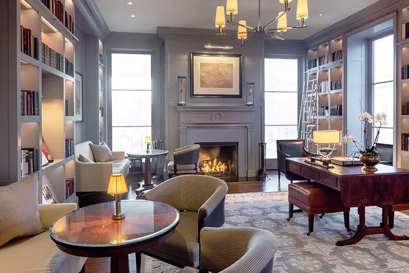 Keswick Hall Keswick Hall Elegant Library Lounge Fireplace Millwork Ambient Lighting Keswick Virginia Luxury Resort Photography Greg Ceo Studio Retouching by Valentin Sivyakov