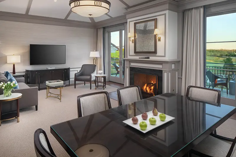 Keswick Hall Keswick Hall Luxury Suite Living and Dining Room Fireplace and Balcony View Interior Design Keswick Virginia Resort Photography Greg Ceo Studio Retouching by Valentin Sivyakov